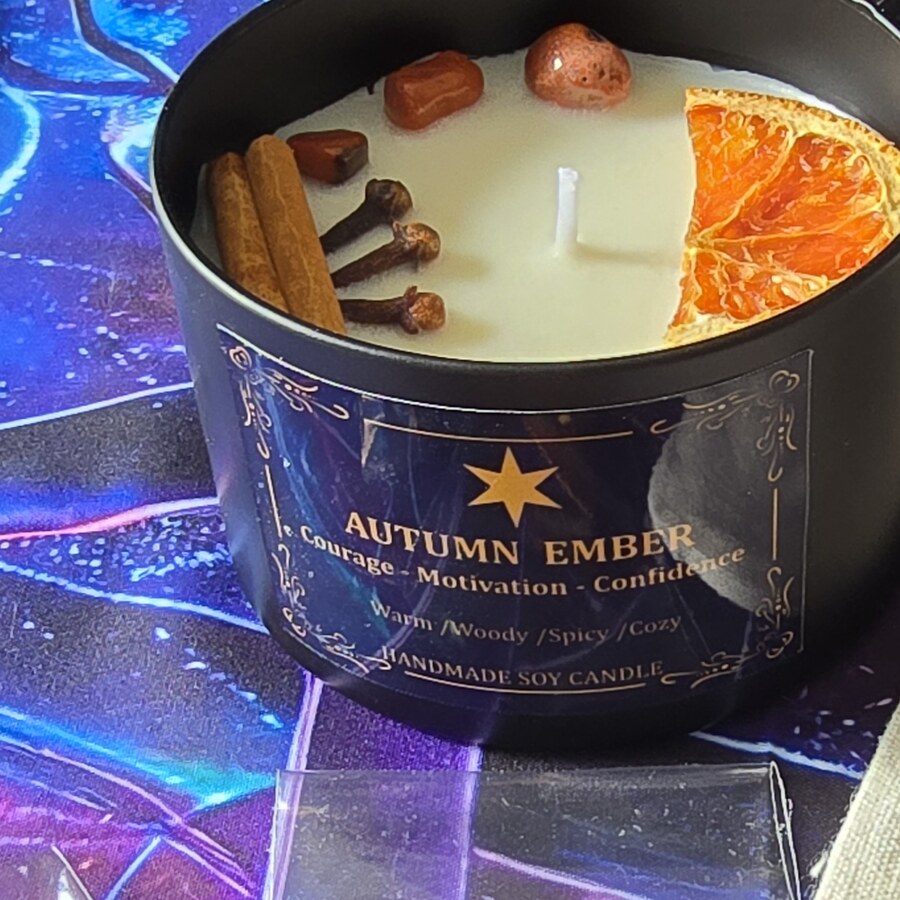 Autumn Ember ritual bundle candle with carnelian, cinnamon and dried orange slice